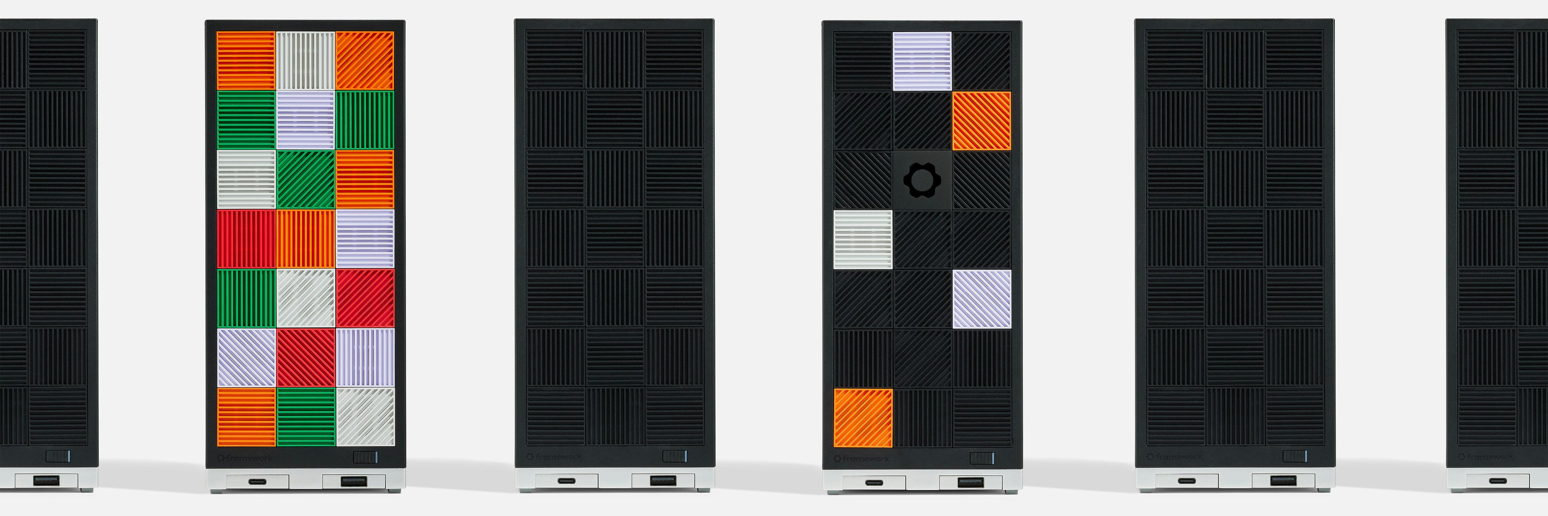 A horizontal line of 6 Framework Desktops