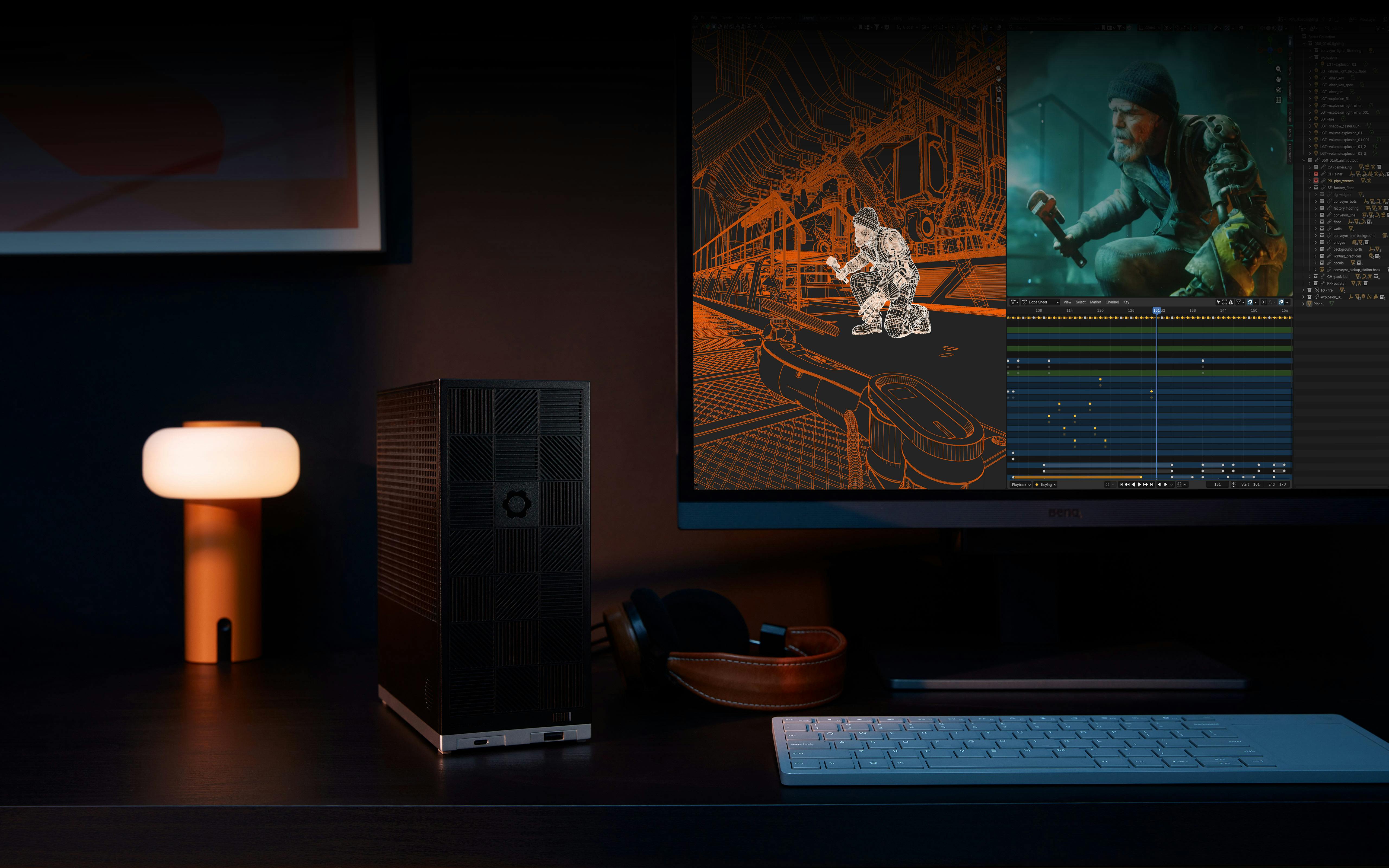 A small form factor Framework Desktop sits on a dark wooden desk next to a monitor displaying a complex 3D Blender scene.