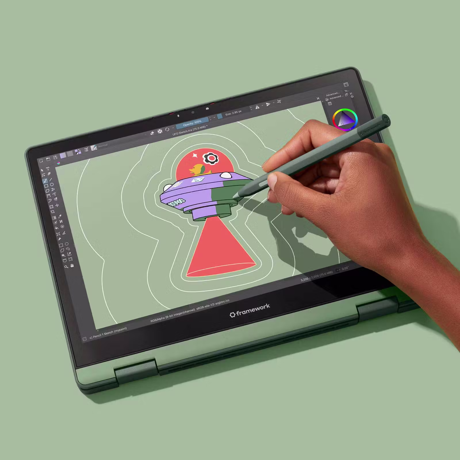 Hand with stylus drawing an image on the Framework Laptop 12
