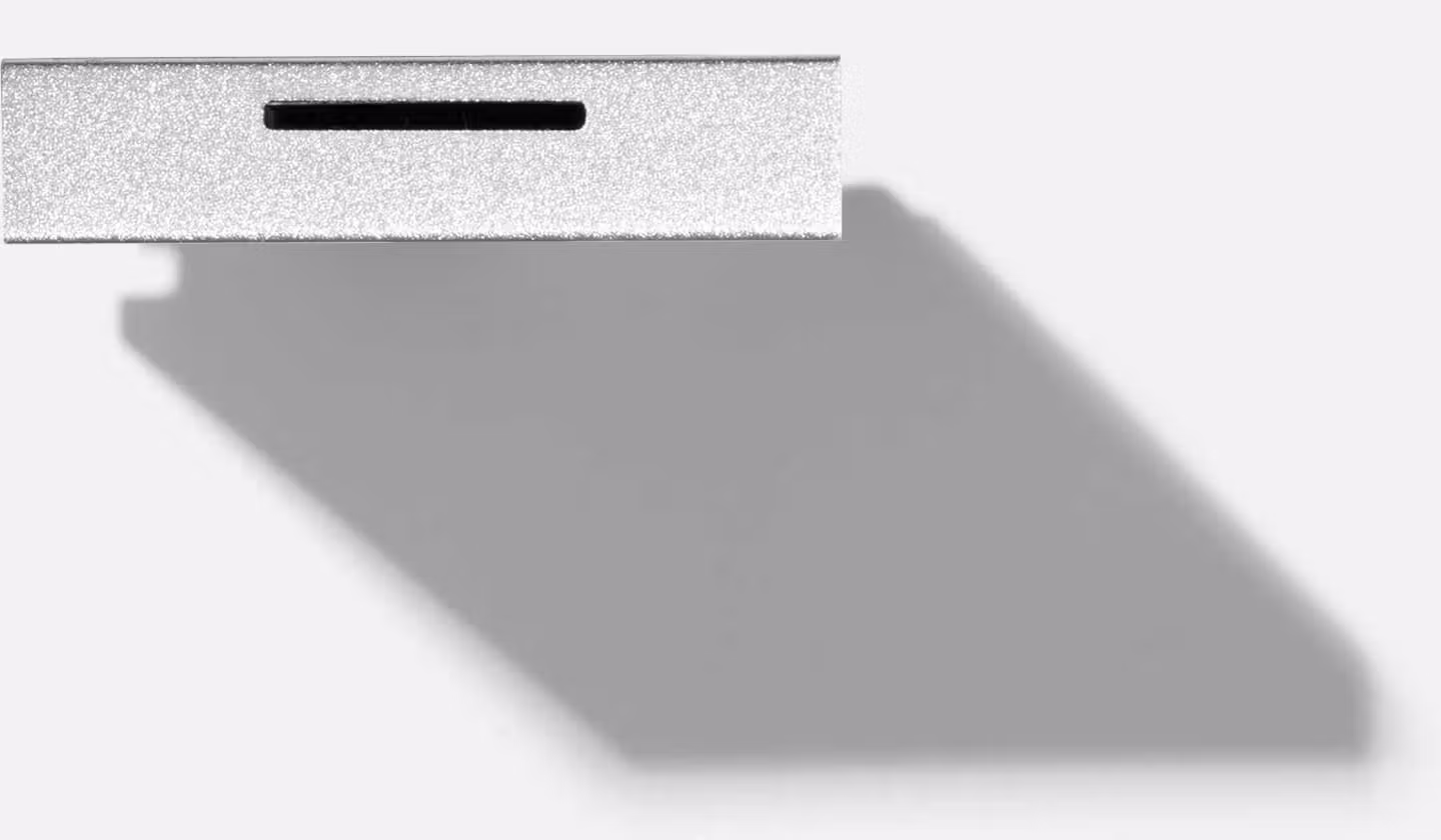 Top-down studio shot of a Framework MicroSD Expansion Card.